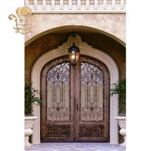 Wrought iron door and wrought iron gates in architecture 