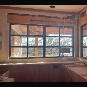 Luxury Wrought Iron Villa Entry Door with Intricate Scroll Patterns and Frosted Glass Panels